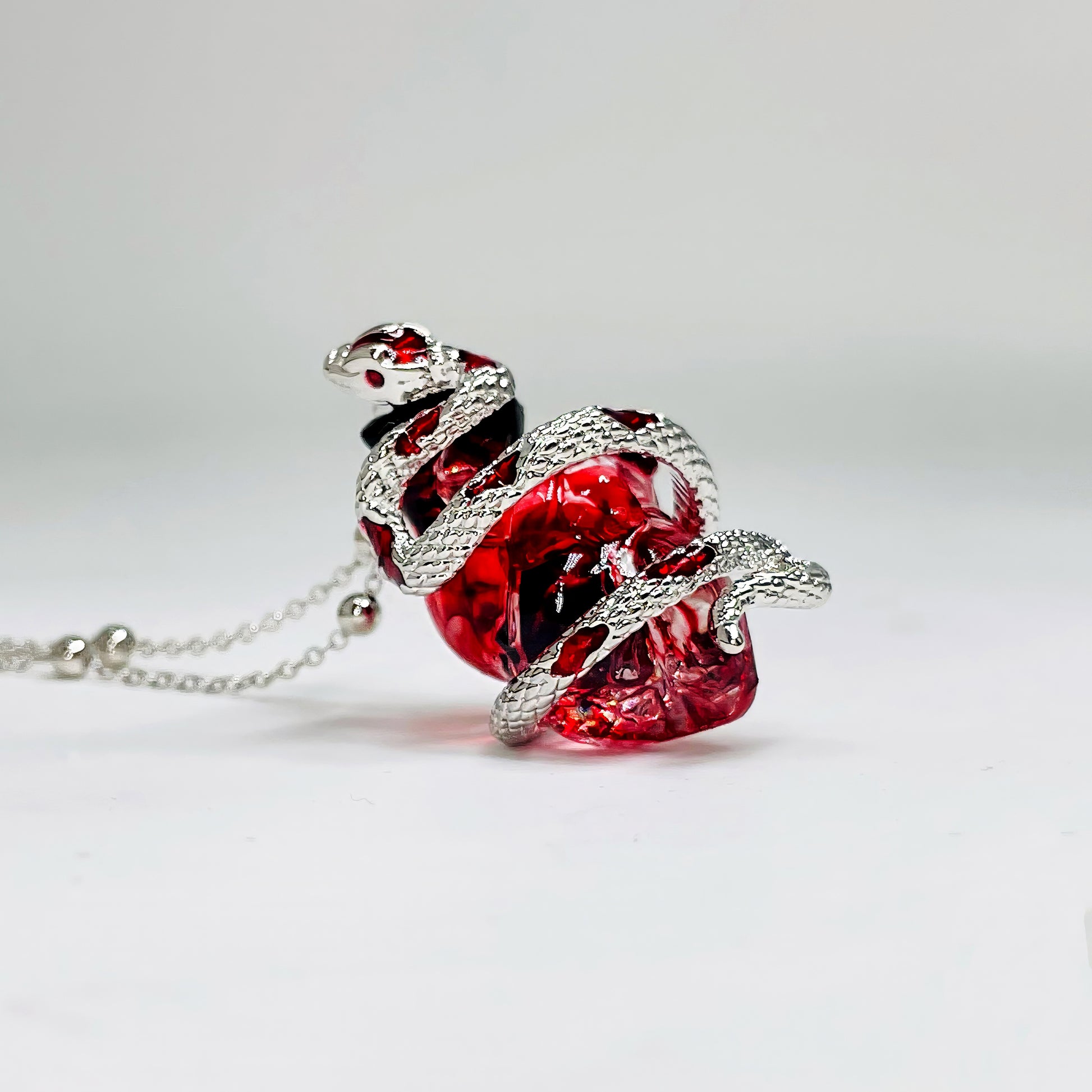 Silver Snake Wrapped Heart Pendant